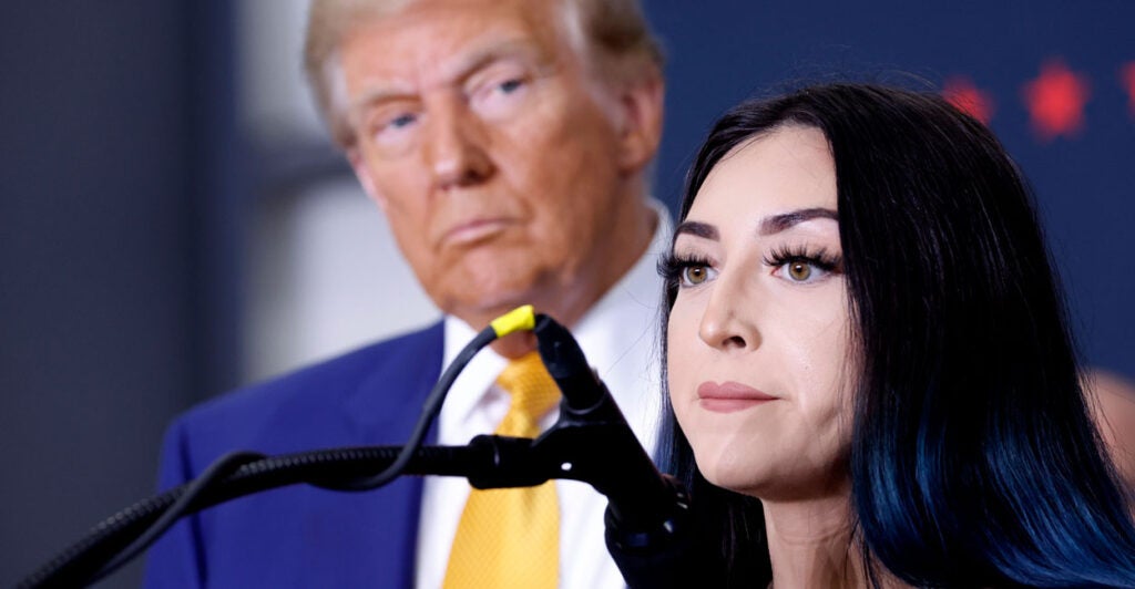 Donald Trump listens as Alexis Nungaray speaks about her slain preteen daughter, Jocelyn, on Oct. 25 in Austin, Texas.
