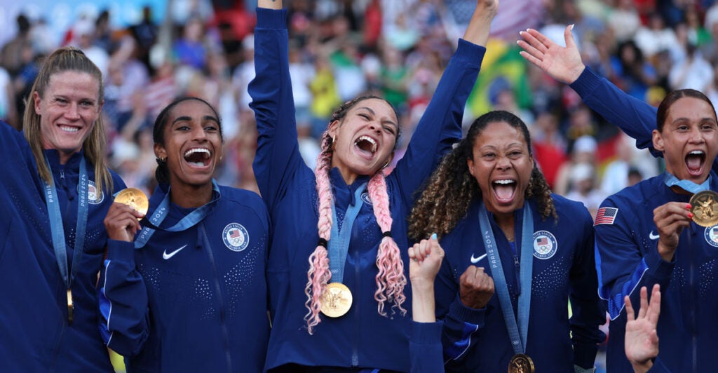 Soccer Olympic gold medalist Trinity Rodman (center) of Team United States and her teammates celebrate last Aug. 10 in Paris.