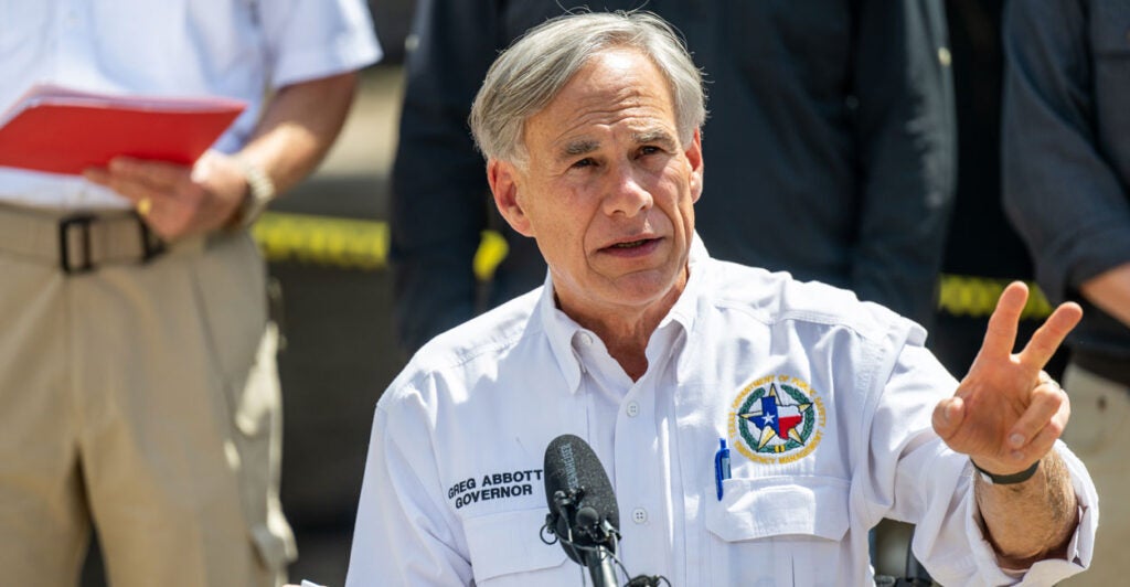 Republican Texas Gov. Greg Abbott speaks to reporters.