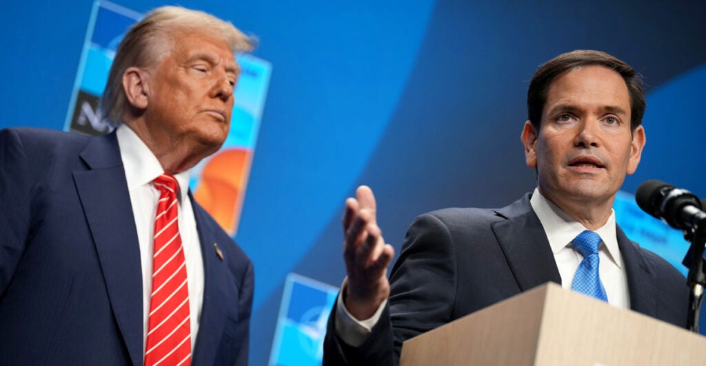 President Donald Trump (L) and Secretary of State Marco Rubio (R)