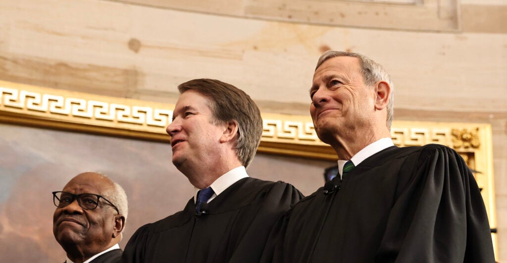 U.S. Associate Supreme Court Justices Clarence Thomas and Brett Kavanaugh and U.S. Supreme Court Chief Justice John Roberts react during inauguration ceremonies in the Rotunda of the U.S. Capitol on January 20, 2025 in Washington, DC. Donald Trump takes office for his second term as the 47th president of the United States.