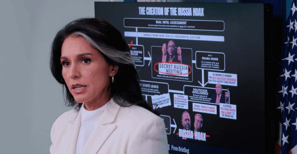 Tulsi Gabbard speaks in front of a screen with a graphic explaining "The Creation of the Russia Hoax."