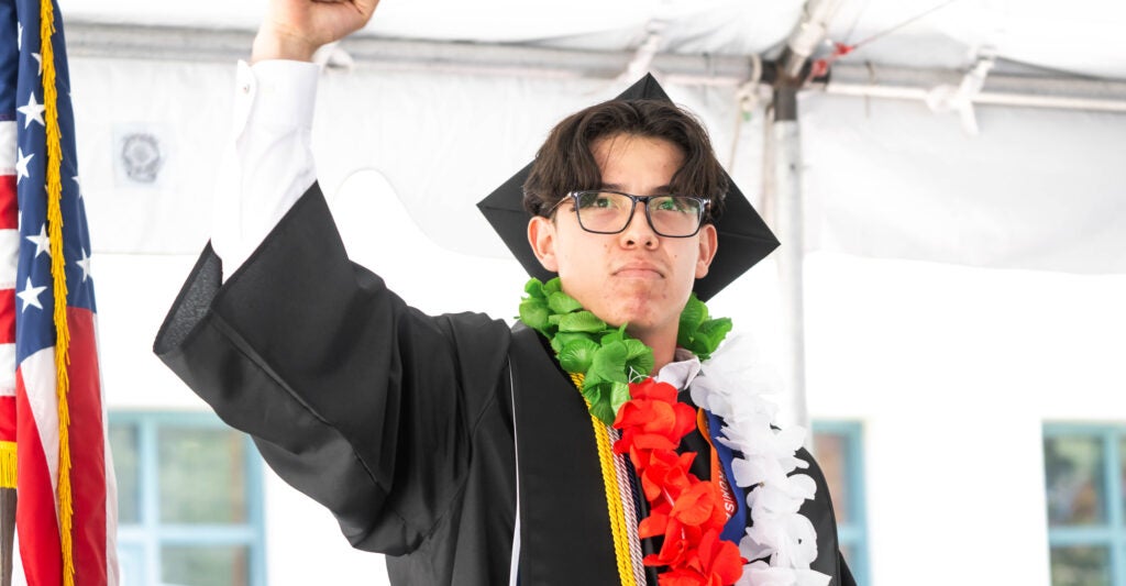 Valedictorian David Vilches addresses students during Los Angeles Mission College's 50th commencement ceremony in Sylmar on Tuesday, June 10, 2025.