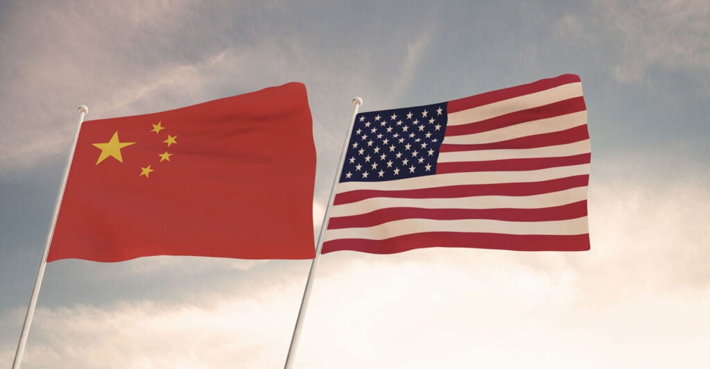 U.S. and Chinese flags fly alongside one another