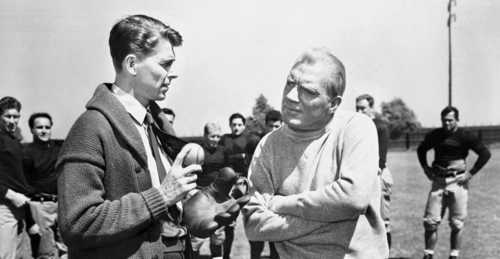 Actor Pat O'Brien (right) played the title role of the famous Notre Dame football coach in the 1940 film "Knute Rockne, All-American." Forty years before winning the presidency, Ronald Reagan portrayed star player George Gipp, the "Gipper," whose death spawned the famous line "Win one for the Gipper."