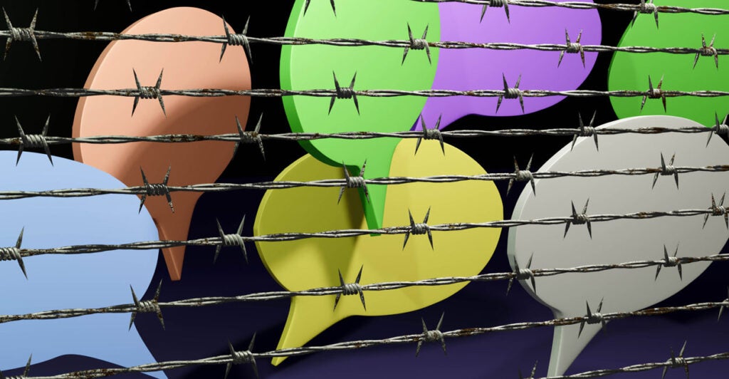 A graphic featuring colorful quote bubbles behind a barbed wire fence, symbolizing censorship.