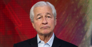 JPMorgan Chase CEO Jamie Dimon against a red background.
