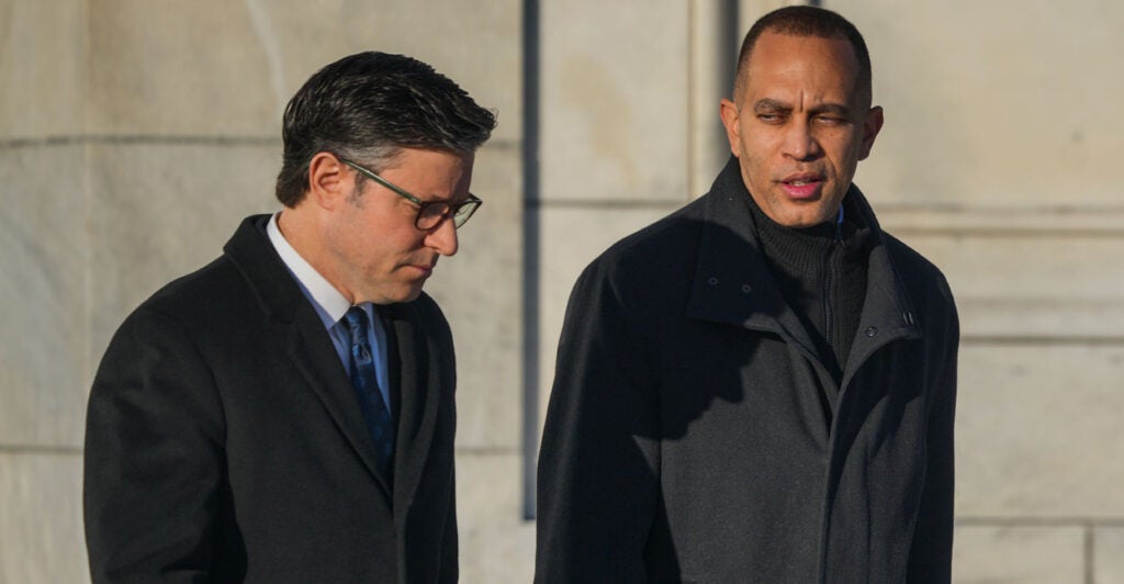 Speaker Mike Johnson and House Minority Leader Hakeem Jeffries, D-N.Y., walk together outside of the U.S. Capitol on January 9, 2025 in Washington, DC.