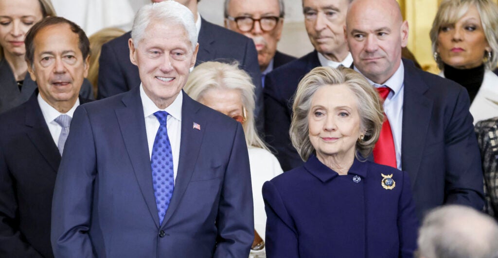 Bill and Hillary Clinton stand together at the inauguration of President Donald Trump.