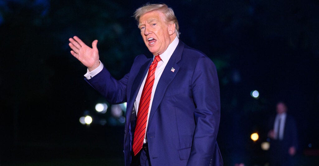 President Donald Trump waves