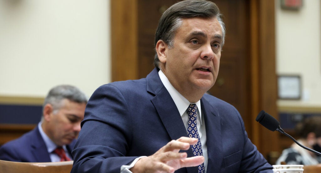 Jonathan Turley looks straight into the camera.