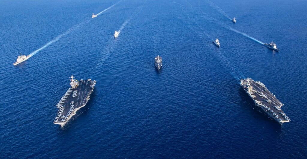US Navy carriers in an aerial shot.