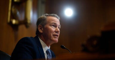Sen. Jon Husted, R-Ohio, speaks into the microphone during a Senate panel's April 2 hearing.
