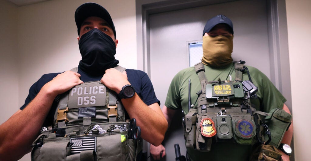 Federal immigration agents are seen here in the Jacob K. Javits Federal Building in New York City on Aug. 6.