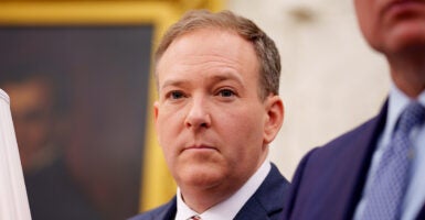 Lee Zeldin in a suit in the Oval Office
