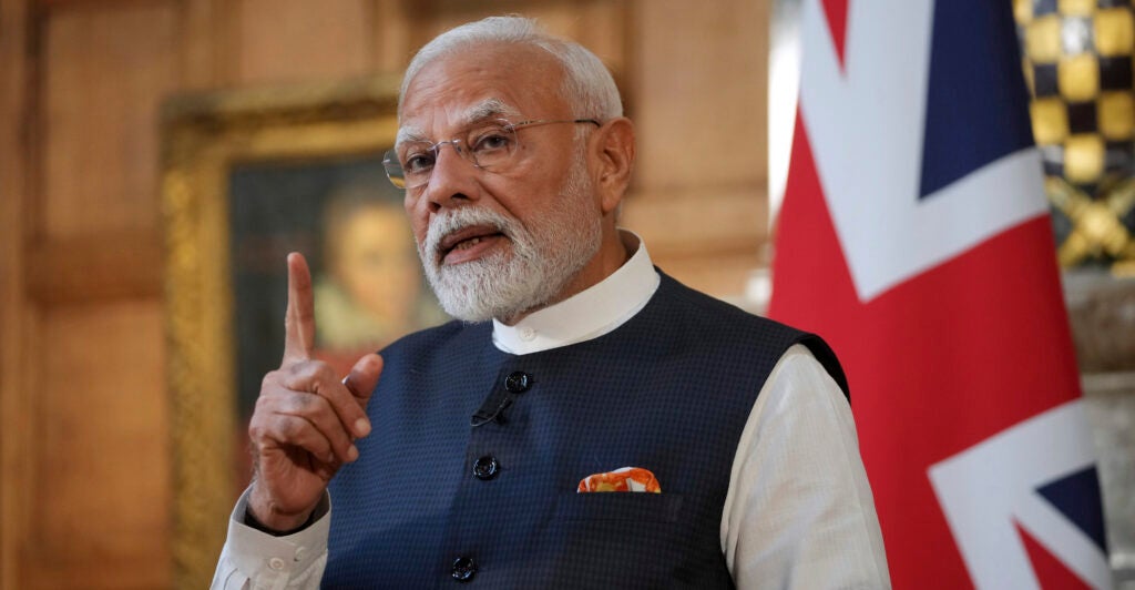 Prime Minister Narendra Modi of India gestures during a press conference with Britain's Prime Minister Keir Starmer