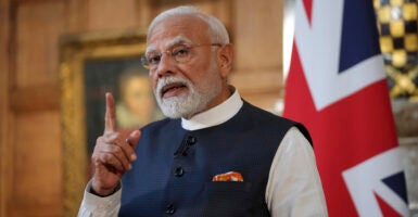 Prime Minister Narendra Modi of India gestures during a press conference with Britain's Prime Minister Keir Starmer