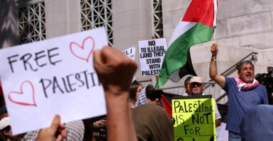 The Palestinian Youth Movement, Stop LAPD Spying, Party for Socialism and Liberation, Southern California Students for Justice in Palestine and others attend a press conference on the steps of City Hall.