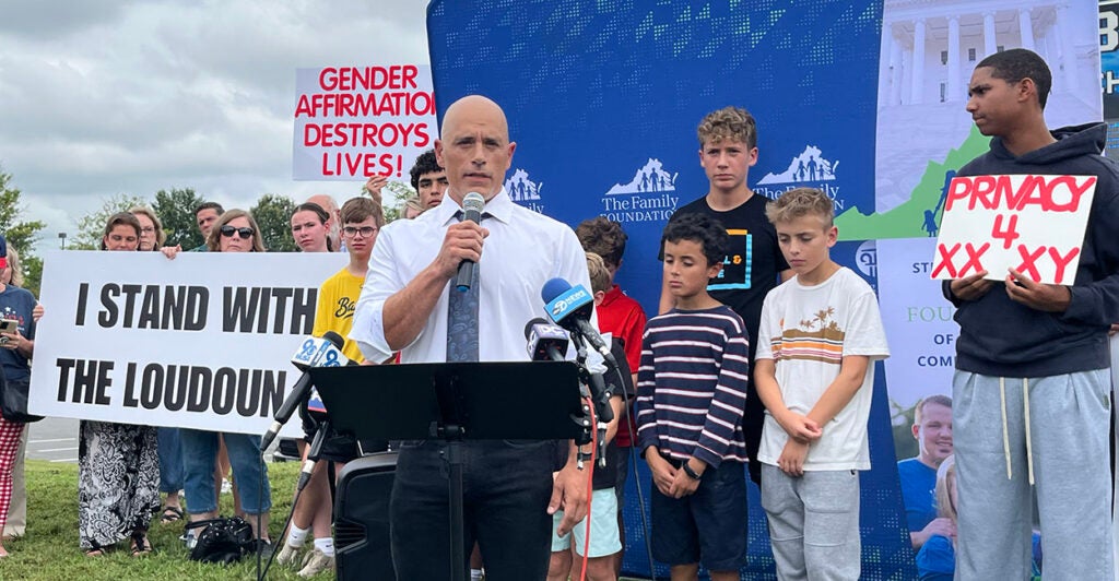 Sean Wolfe in front of a crowd