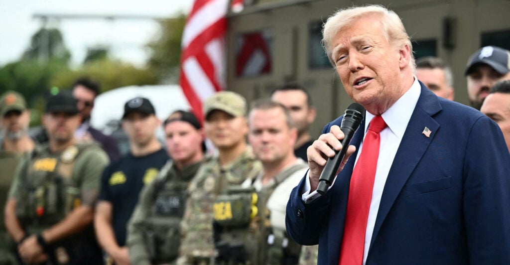 Trump speaks to federal law enforcement in front of armored vehicles in Washington, D.C.