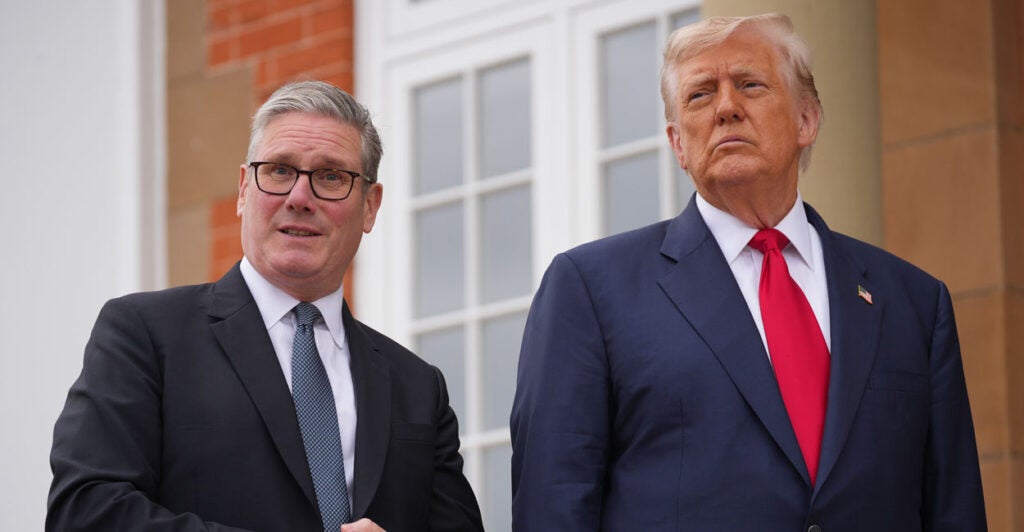 Keir Starmer and Donald Trump stand beside each other while speaking to reporters.