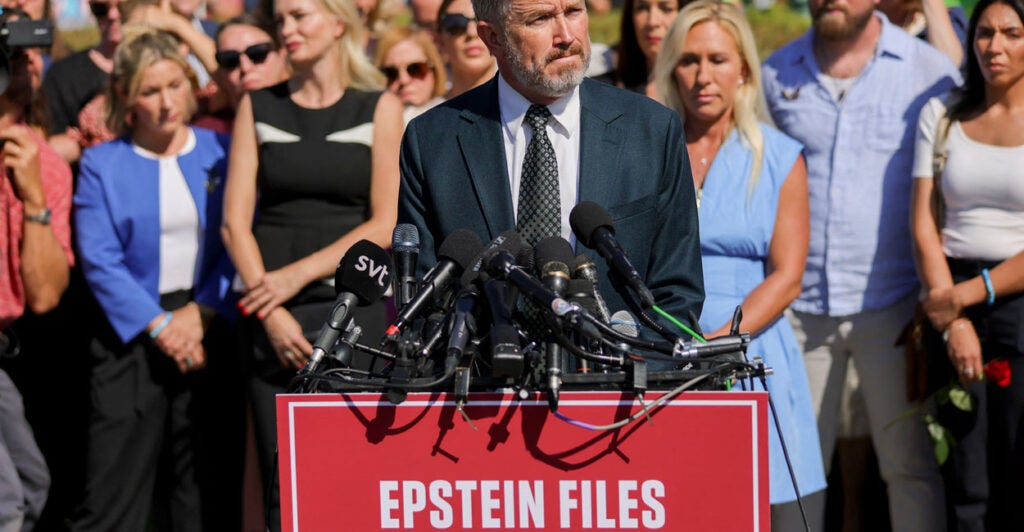 Rep. Thomas Massie, R-Ky., speaks at a news conference alongside others, including alleged victims of the now-deceased sex offender Jeffrey Epstein, outside the Capitol on Wednesday.