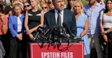 Rep. Thomas Massie, R-Ky., speaks at a news conference alongside others, including alleged victims of the now-deceased sex offender Jeffrey Epstein, outside the Capitol on Wednesday.