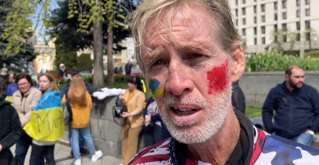 This screengrab—taken from AFP-TV video on Sept. 16, 2024—shows now-convicted would-be presidential assassin Ryan Routh speaking in an interview at a rally urging foreign leaders and international organizations to help with the evacuation of civilians and Ukrainian servicemen from central Kyiv on April 27, 2022, amid Russia's invasion of Ukraine. (Nicolas Garcia/AFP-TV/AFP via Getty Images)