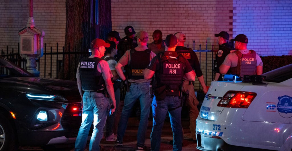 D.C. Metropolitan Police Department officers and federal agents are seen patrolling the Foggy Bottom neighborhood of Washington, D.C., on Aug. 29.