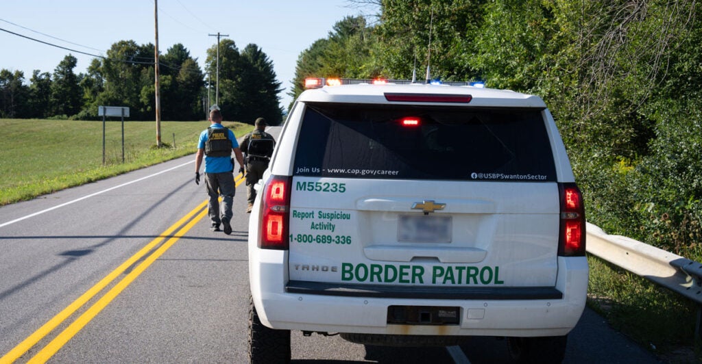 Swanton Sector Border Patrol agents conduct a search near Rouses Point, New York, on Aug. 21.