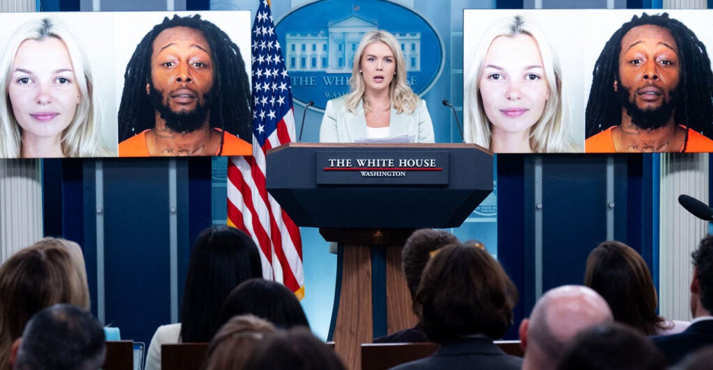 Karoline Leavitt flanked on both sides by portraits of Iryna Zarutska and her alleged killer Decarlos Brown Jr.