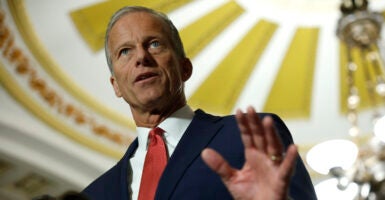 Senate Majority Leader John Thune, R-S.D., speaks to reporters at the Capitol on Tuesday.
