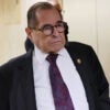 Rep. Jerrold Nadler, in dark suit, walks down a hallway in the U.S. Capitol.