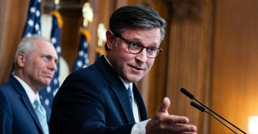 Speaker of the House Mike Johnson and House Majority Leader Steve Scalise (background), both R-La.