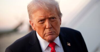 U.S. President Donald Trump steps off Air Force One on September 7, 2025.