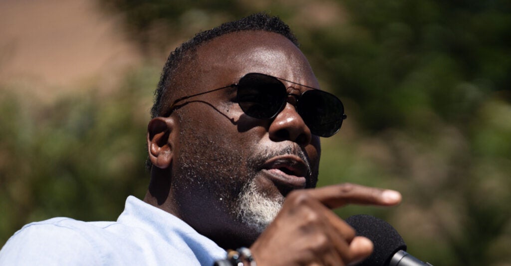 Chicago Mayor Brandon Johnson speaks to a crowd.