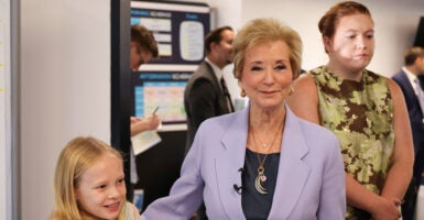 Everest Nevraumont (L) and U.S. Secretary of Education Linda McMahon at Alpha School Austin on September 09, 2025 in Austin, Texas.