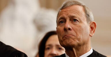 US Supreme Court Chief Justice John Roberts attends inauguration ceremonies in the Rotunda of the US Capitol.
