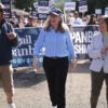 Virginia Democratic gubernatorial candidate Abigail Spanberger (center) marches in the annual Labor Day festival parade with the Democrat nominee for lieutenant governor, state Sen. Ghazala Hashmi (right), and Democrat nominee for attorney general Jay Jones on Sept. 1 in Buena Vista, Va.