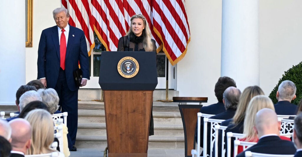 President Donald Trump and Erika Kirk, Charlie Kirk's widow, participate in a Presidential Medal of Freedom ceremony honoring the late conservative activist in the Rose Garden of the White House on Tuesday.