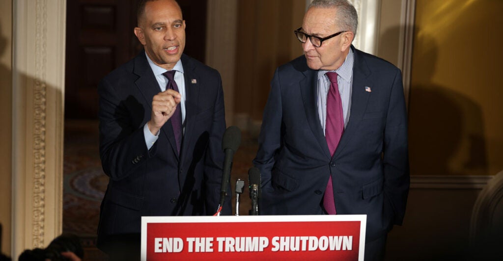 Senate Minority Leader Chuck Schumer (right) and House Minority Leader Hakeem Jeffries, both D-N.Y., speak at a Capitol news conference on the government shutdown on Oct. 16.