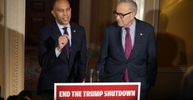Senate Minority Leader Chuck Schumer (right) and House Minority Leader Hakeem Jeffries, both D-N.Y., speak at a Capitol news conference on the government shutdown on Oct. 16.
