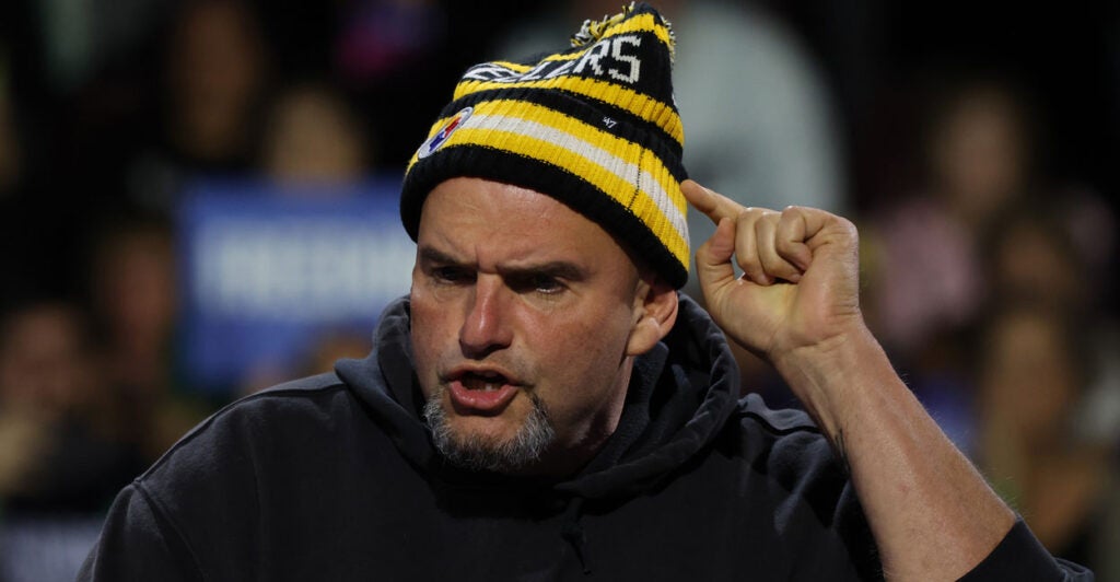 Wearing Pittsburgh Steelers gear, Sen. John Fetterman, D-Pa.—seen here speaking at a campaign rally for then-Democratic presidential nominee Kamala Harris on Oct. 14, 2024, in Erie, Pa.—this week criticized of some of her campaign rhetoric.