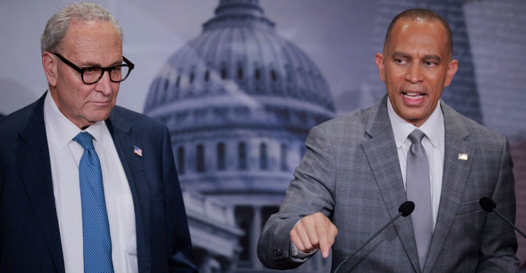Senate Minority Leader Chuck Schumer (left) and House Minority Leader Hakeem Jeffries, both D-N.Y., speak to reporters at the Capitol on Monday.