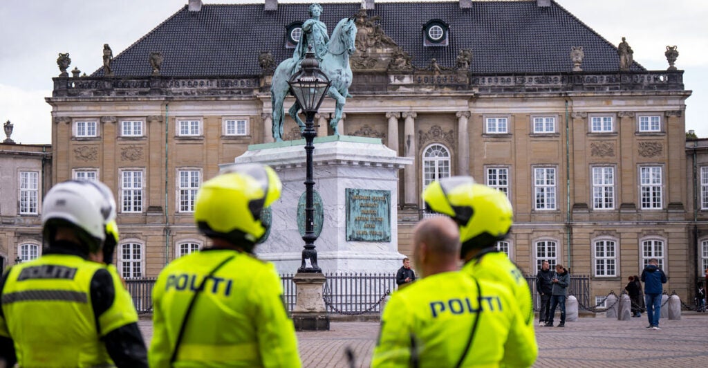 Police from Denmark, Sweden and Norway patrol outside the Amalienborg Palace, the official residence for the Danish royal family, in Copenhagen, Denmark, on Sept. 29.
