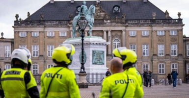 Police from Denmark, Sweden and Norway patrol outside the Amalienborg Palace, the official residence for the Danish royal family, in Copenhagen, Denmark, on Sept. 29.