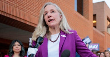 Abigail Spanberger in blue and white