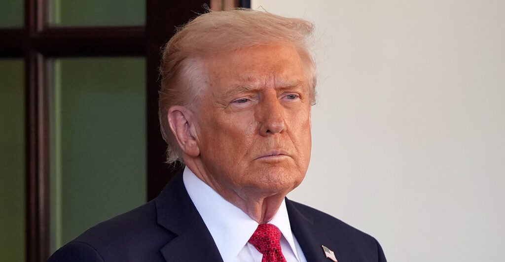 Donald Trump looks into the distance. The "Homeless Industrial Complex" is attacking Trump's policies even though they are more likely to actually solve the homelessness crisis, a new report finds.