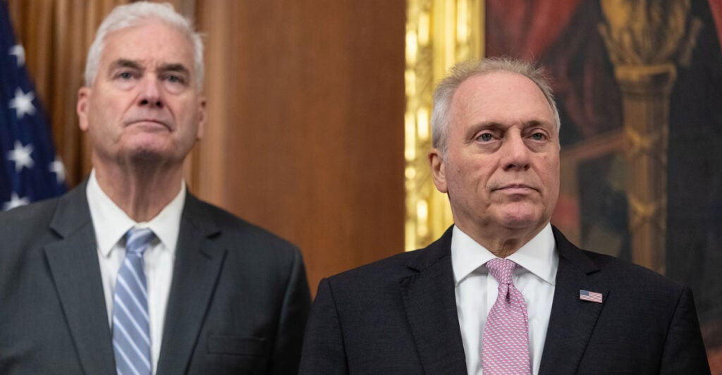 Republican House Whip Tom Emmer (left) and Republican House Majority Leader Steve Scalise stand at a press conference on the shutdown at the Capitol.