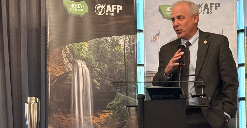 Speaker Matt Huffman speaks at the podium in front of AFP-Ohio sign.